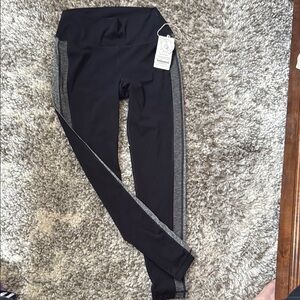 Vuori Racer HR Leggings Size Medium Black and Grey. New with tags.